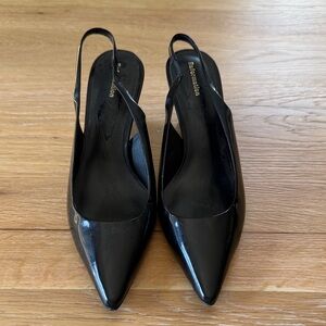 Reformation Pointed Slingback Pumps in Black